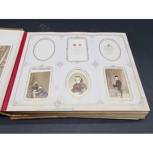 36 - CARTE DE VISITE ALBUM: a mid-Victorian album containing numerous window mounted cdv & cabinet ca... 