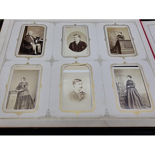 36 - CARTE DE VISITE ALBUM: a mid-Victorian album containing numerous window mounted cdv & cabinet ca... 