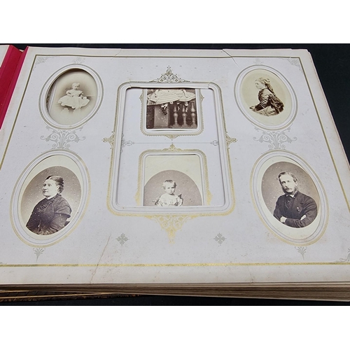 36 - CARTE DE VISITE ALBUM: a mid-Victorian album containing numerous window mounted cdv & cabinet ca... 