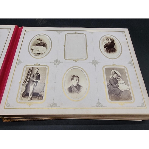 36 - CARTE DE VISITE ALBUM: a mid-Victorian album containing numerous window mounted cdv & cabinet ca... 