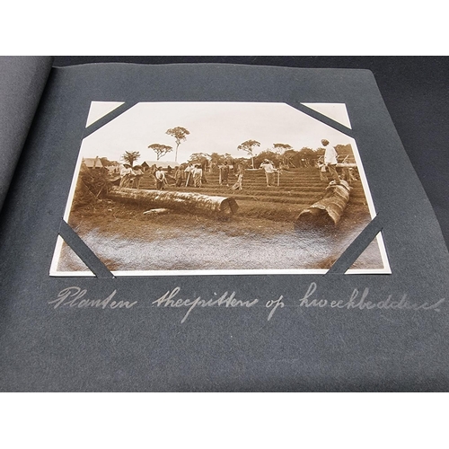 47 - INDONESIA: PHOTOGRAPH ALBUM: containing approx 200 corner mounted original photographs mostly of col... 