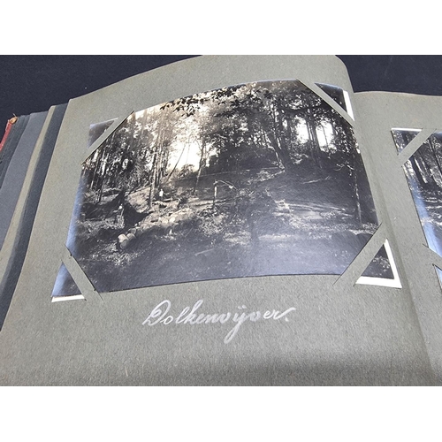 47 - INDONESIA: PHOTOGRAPH ALBUM: containing approx 200 corner mounted original photographs mostly of col... 