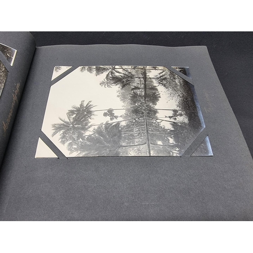 47 - INDONESIA: PHOTOGRAPH ALBUM: containing approx 200 corner mounted original photographs mostly of col... 