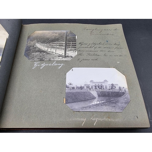 47 - INDONESIA: PHOTOGRAPH ALBUM: containing approx 200 corner mounted original photographs mostly of col... 