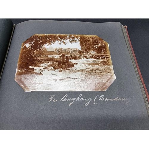 47 - INDONESIA: PHOTOGRAPH ALBUM: containing approx 200 corner mounted original photographs mostly of col... 