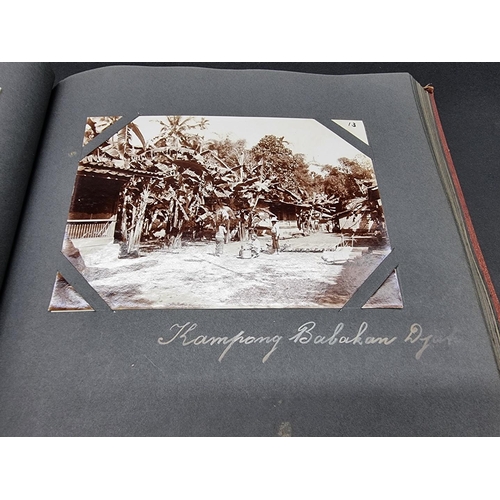 47 - INDONESIA: PHOTOGRAPH ALBUM: containing approx 200 corner mounted original photographs mostly of col... 