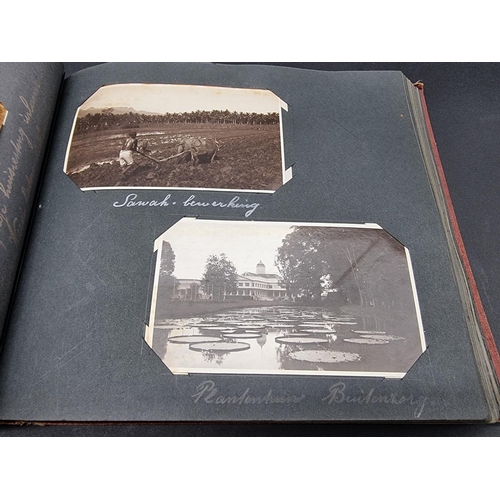 47 - INDONESIA: PHOTOGRAPH ALBUM: containing approx 200 corner mounted original photographs mostly of col... 