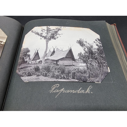 47 - INDONESIA: PHOTOGRAPH ALBUM: containing approx 200 corner mounted original photographs mostly of col... 