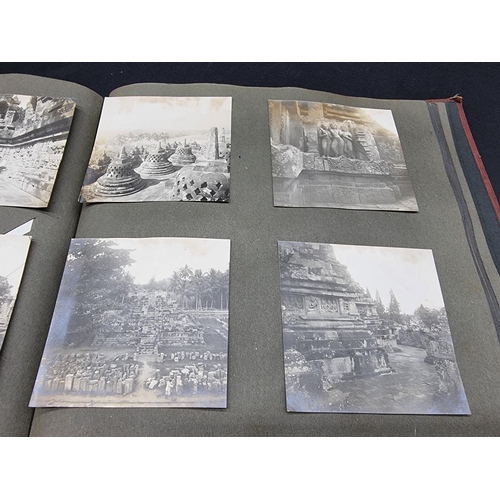 47 - INDONESIA: PHOTOGRAPH ALBUM: containing approx 200 corner mounted original photographs mostly of col... 