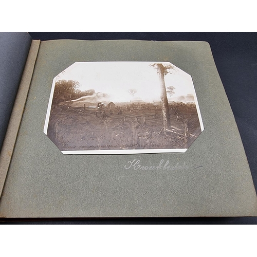 47 - INDONESIA: PHOTOGRAPH ALBUM: containing approx 200 corner mounted original photographs mostly of col... 