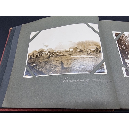 47 - INDONESIA: PHOTOGRAPH ALBUM: containing approx 200 corner mounted original photographs mostly of col... 