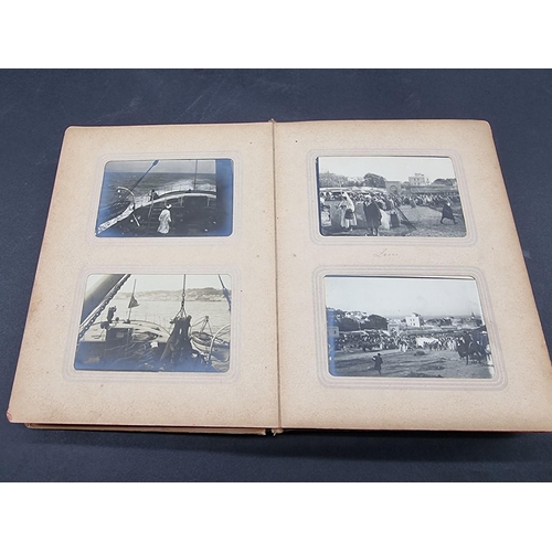 49 - PHOTOGRAPH ALBUMS: a group of 3 small format early c20 albums, to include an album of 91 b&... 