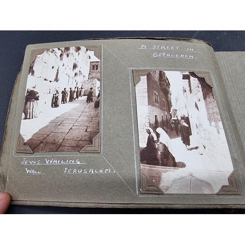 49 - PHOTOGRAPH ALBUMS: a group of 3 small format early c20 albums, to include an album of 91 b&... 