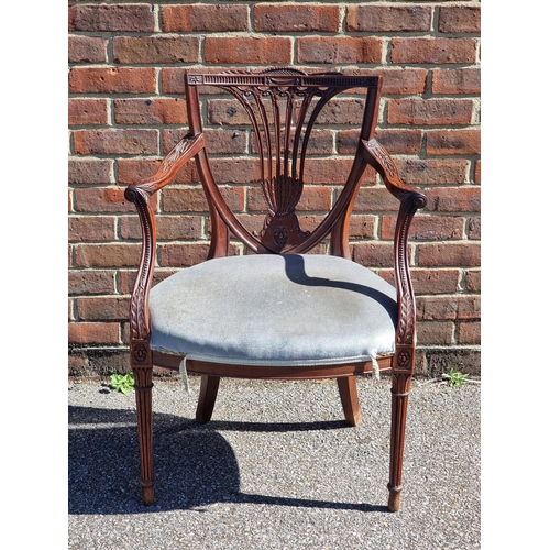 1083 - A good George III carved mahogany elbow chair.