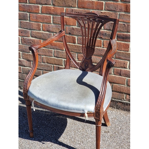 1083 - A good George III carved mahogany elbow chair.