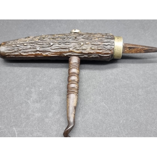 1634 - An early 1900 stag antler direct pull corkscrew with spike. 