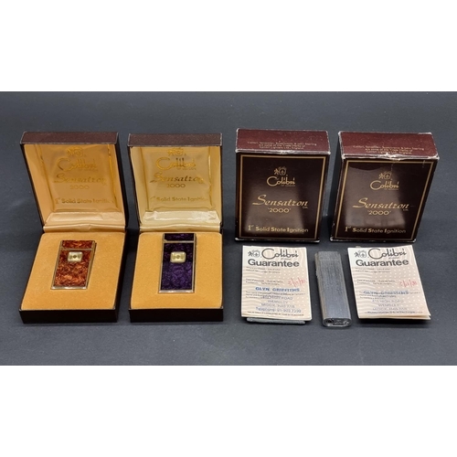 1637 - Two Colibri 'Sensatron 2000' lighters, each boxed and with guarantee card; together with a Japanese ... 