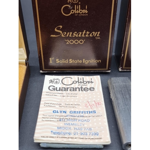 1637 - Two Colibri 'Sensatron 2000' lighters, each boxed and with guarantee card; together with a Japanese ... 