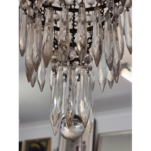 1640 - An old brass and faceted glass drop four tier chandelier, 31.5cm diameter x 36cm high; together with... 