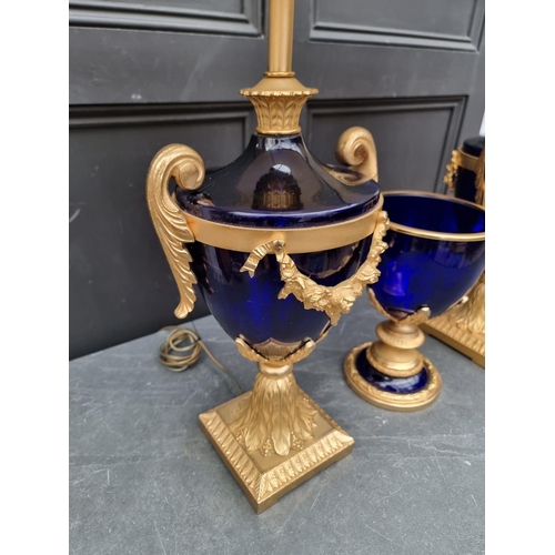 1657 - A pair of large blue glass and gilt brass table lamps, total height 82cm; together with a similar ur... 