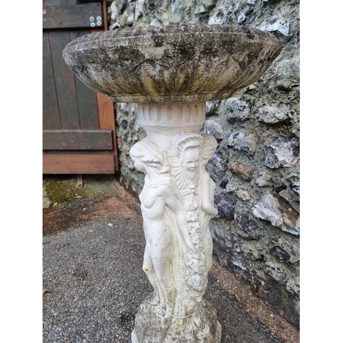 1663 - A composition stone Three Graces birdbath, 78cm high.