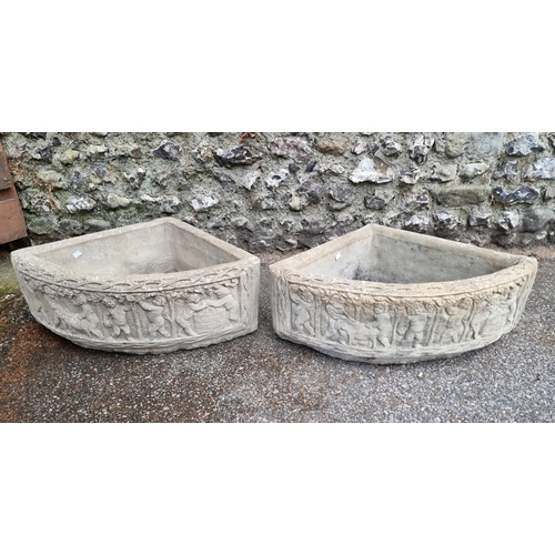 1668 - A pair of composition stone corner quadrant planters, 72cm wide. (2)