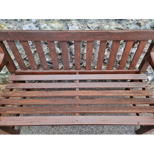 1674 - A hardwood garden bench, 122cm wide.