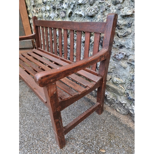 1674 - A hardwood garden bench, 122cm wide.