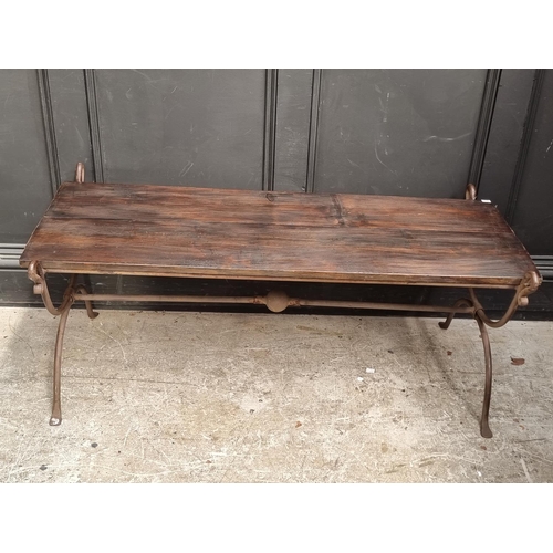 1676 - A steel and stained pine bench, 117.5cm wide.