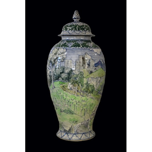 1733 - A very large Dutch polychrome painted vase and cover, 91.5cm high.