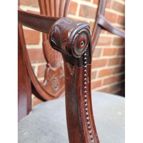 1083 - A good George III carved mahogany elbow chair.