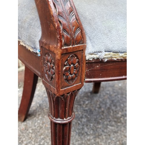 1083 - A good George III carved mahogany elbow chair.