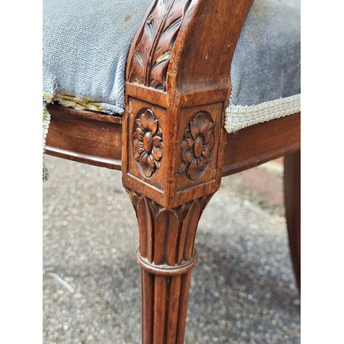 1083 - A good George III carved mahogany elbow chair.