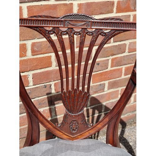 1083 - A good George III carved mahogany elbow chair.