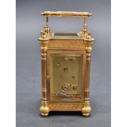 1146 - An antique French gilt brass carriage timepiece, height including handle 15.5cm.