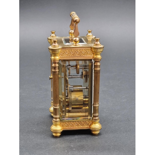 1146 - An antique French gilt brass carriage timepiece, height including handle 15.5cm.