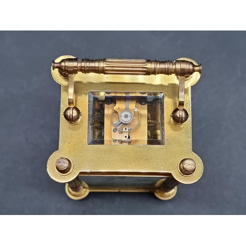 1146 - An antique French gilt brass carriage timepiece, height including handle 15.5cm.