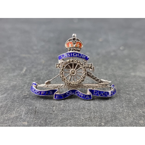 300 - A white metal, marcasite and enamel 'Royal Horse Artillery' sweetheart brooch, 41mm wide.... 