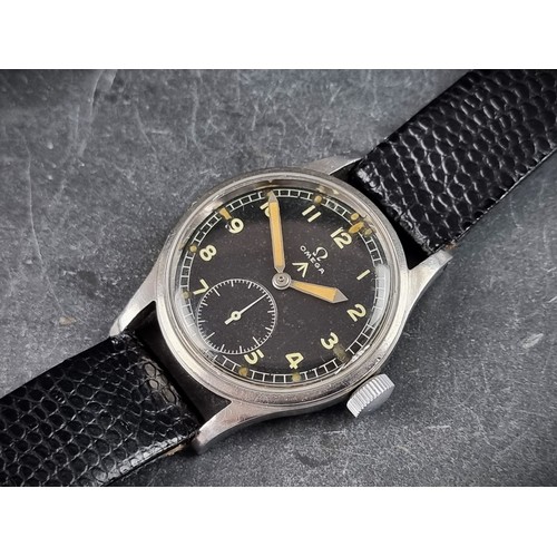 A Military Issue WWII Omega 'Dirty Dozen' stainless steel manual wind wristwatch, 35mm, Ref. Y12148 10676347, the 'W.W.W' military code engraved to case back, on replacement black leather strap.