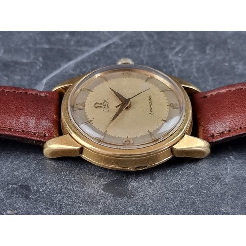 350 - A circa 1957 Omega 'Seamaster' 18ct gold automatic wristwatch, 34mm, Ref. 15762428, Cal. 501, on lat... 