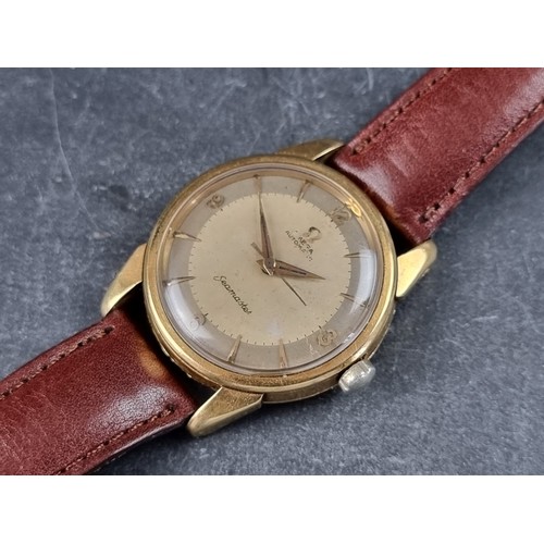 350 - A circa 1957 Omega 'Seamaster' 18ct gold automatic wristwatch, 34mm, Ref. 15762428, Cal. 501, on lat... 