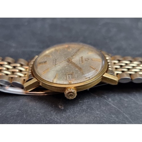 353 - A 1960s Omega 'De Ville Seamaster' 18ct gold automatic wristwatch, 34mm, Ref. 1665020, Cal. 562, on ... 