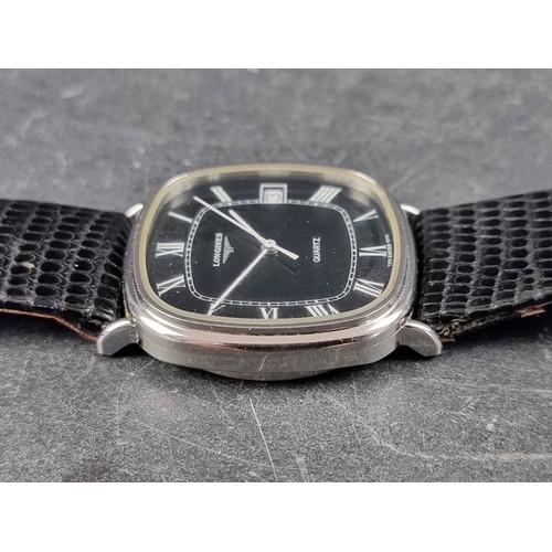 359 - A vintage Longines black dial stainless steel quartz wristwatch, 34mm, Ref. 4174 728, on replacement... 