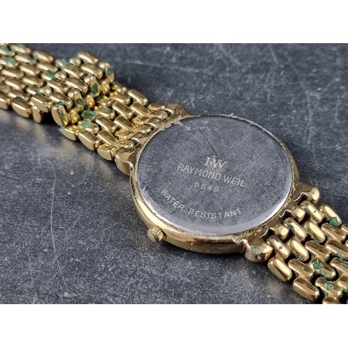 372 - A Raymond Weil gold tone quartz wristwatch, 32mm, Ref. 5549, on original integrated 'beads of rice' ... 