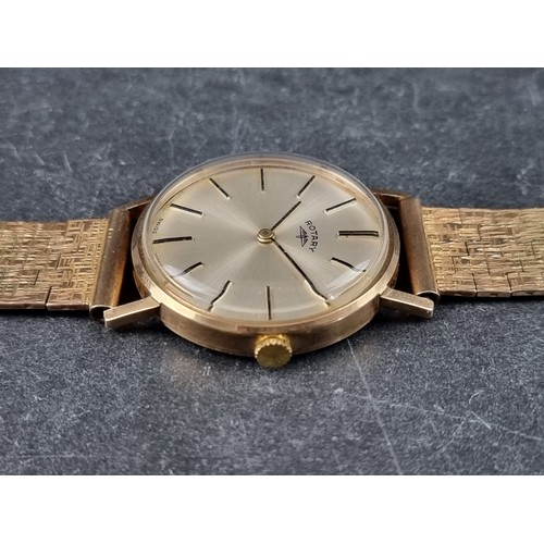 373 - A vintage Rotary 9ct gold manual wind wristwatch, 33mm, on 9ct gold bracelet.