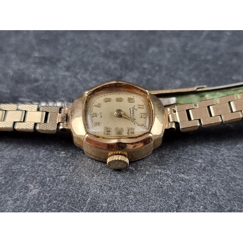 385 - A vintage Everite 9ct gold manual wind ladies wristwatch, 17mm, on rolled gold bracelet.... 