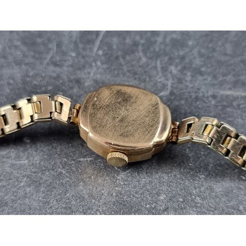 385 - A vintage Everite 9ct gold manual wind ladies wristwatch, 17mm, on rolled gold bracelet.... 