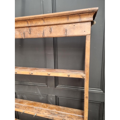 1000 - An 18th century oak potboard dresser and rack, 187.5cm wide.