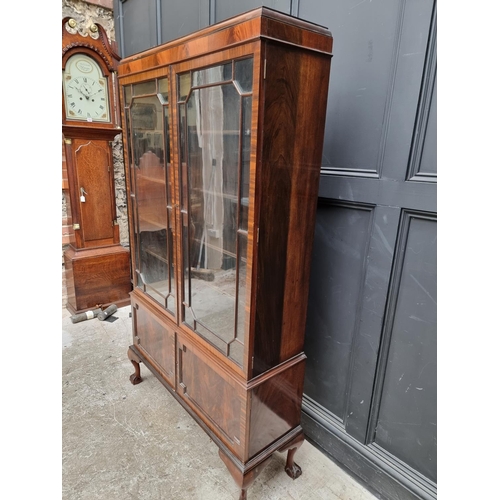 1003 - A circa 1920s mahogany bookcase, 98.5cm wide.