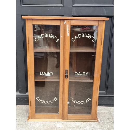 1005 - A walnut bookcase, 85cm wide.